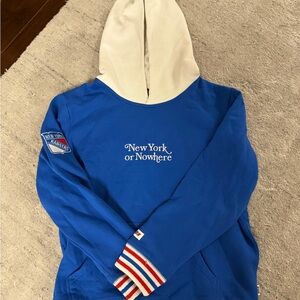 Blue and White Hoodie with Patch